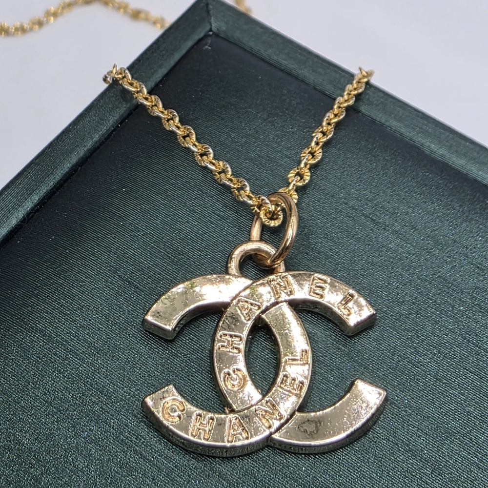 CHANEL Gold Logo Necklace